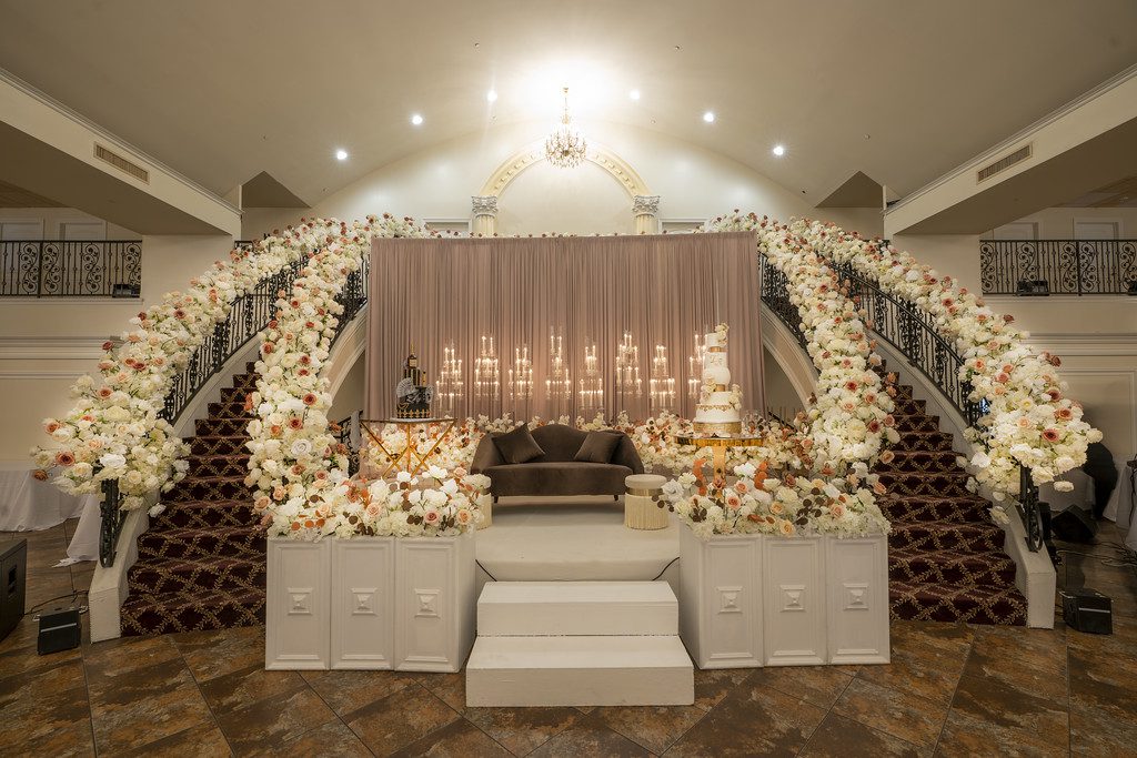 A wedding set up with stairs and flowers